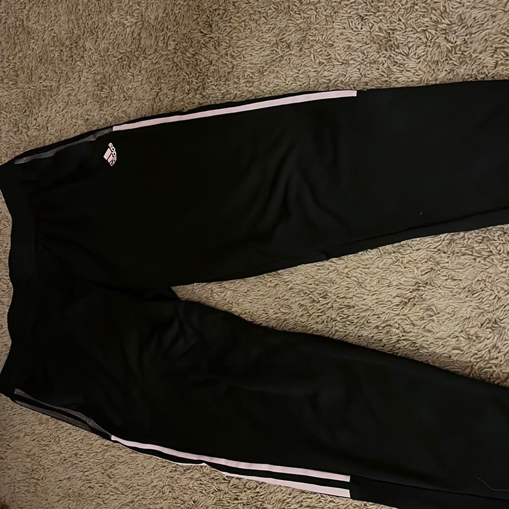 Adidas soccer pants size XL with light pink stripes